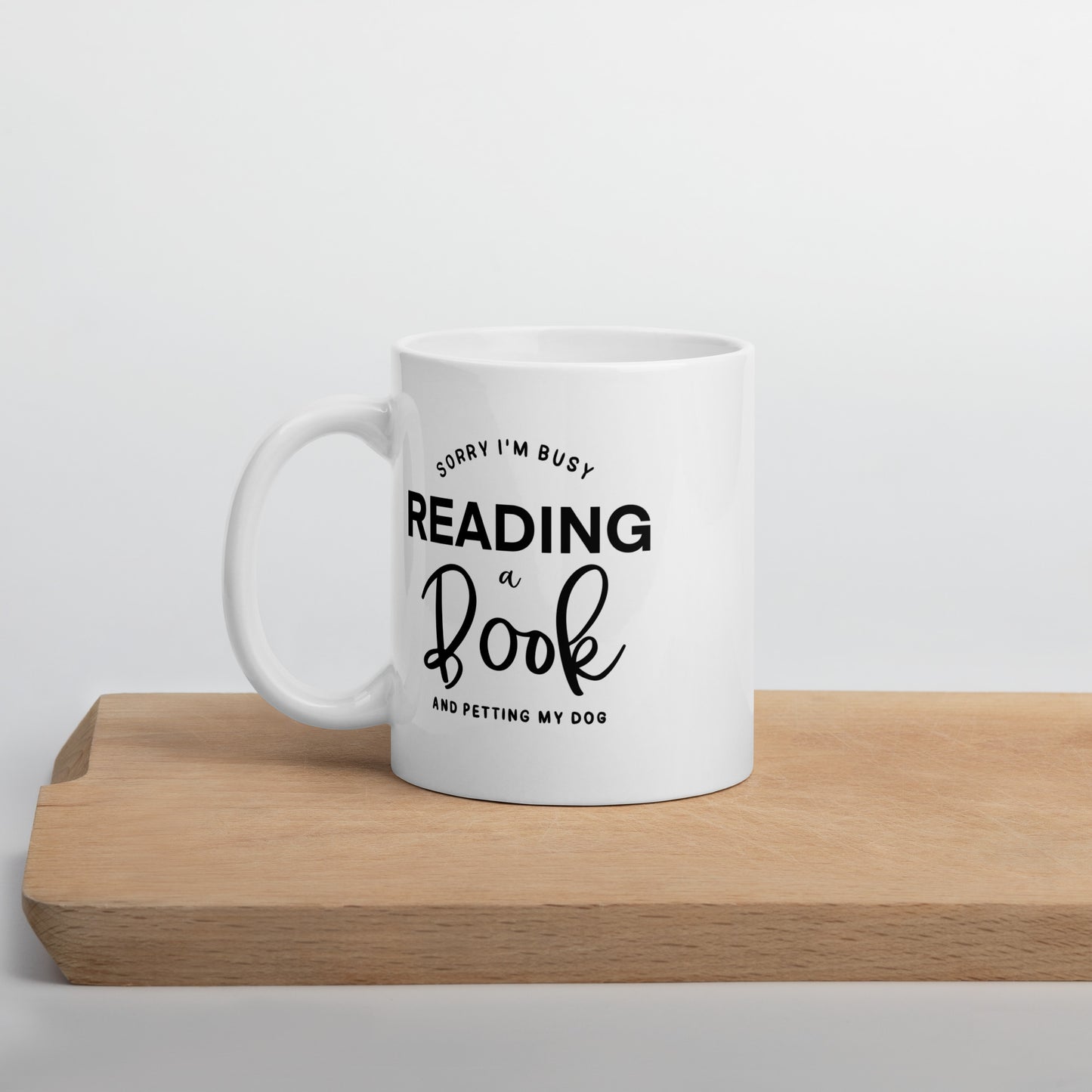 Sorry, I'm Busy Reading a Book & Petting My Dog (White Glossy Mug)